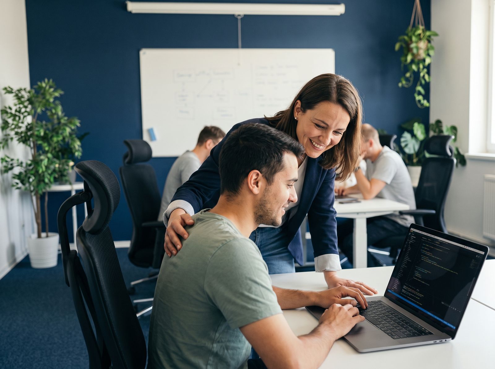 Professional building an AI copilot in a Singapore training workshop