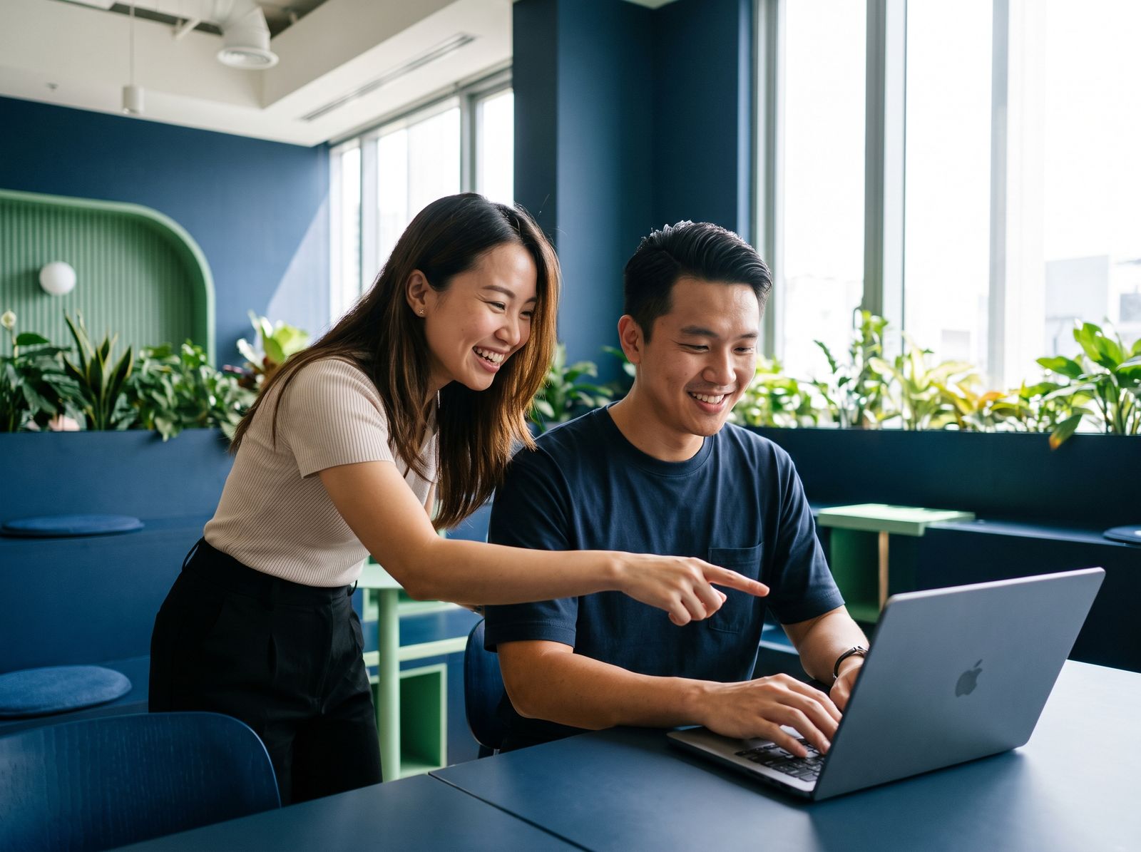 Colleagues testing an AI copilot together in Singapore