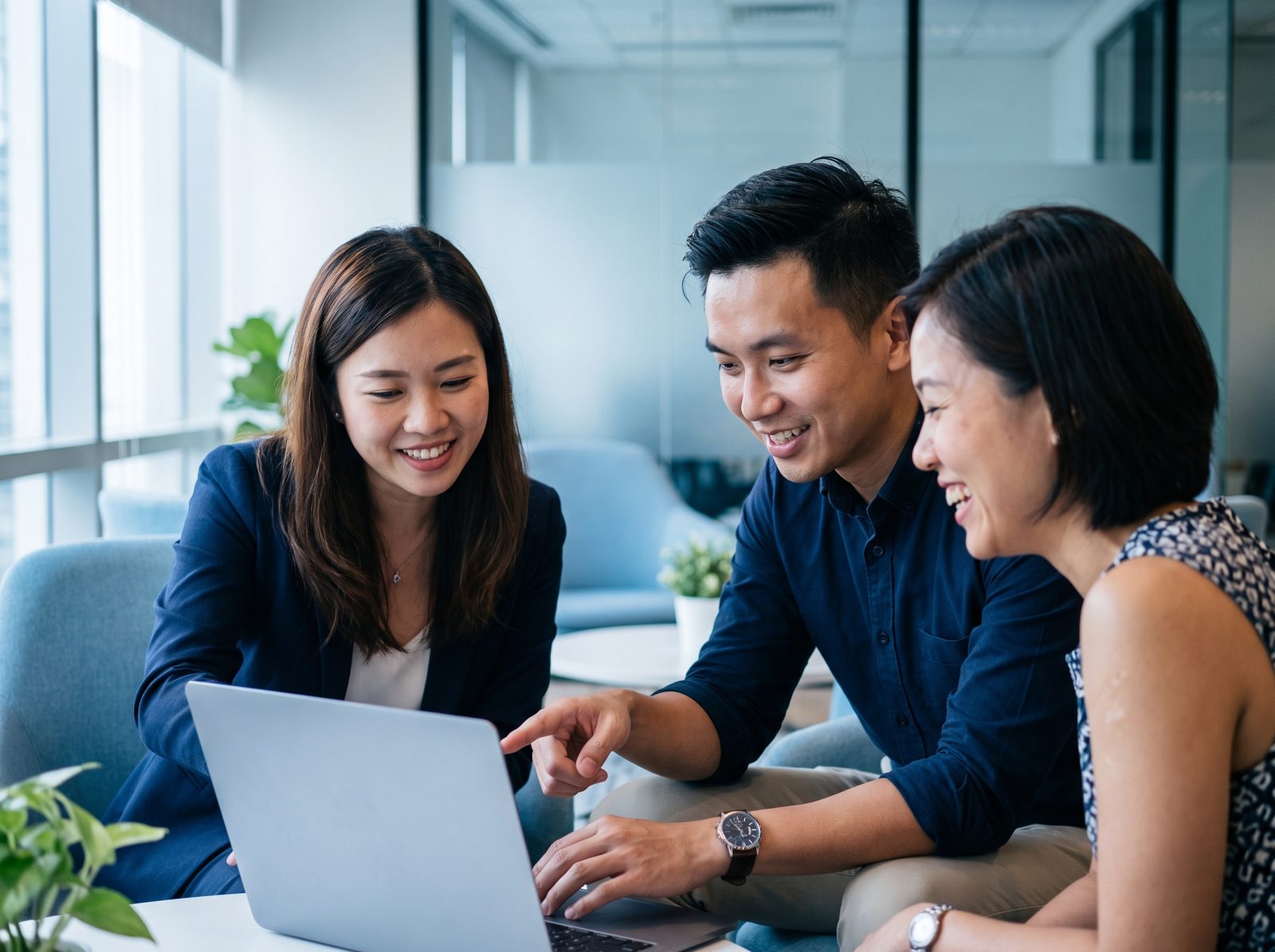 Professionals learning to use AI tools during a prompt engineering workshop in Singapore